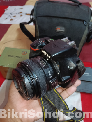 Nikon D3500 with Yongnuo 50mm prime lens.